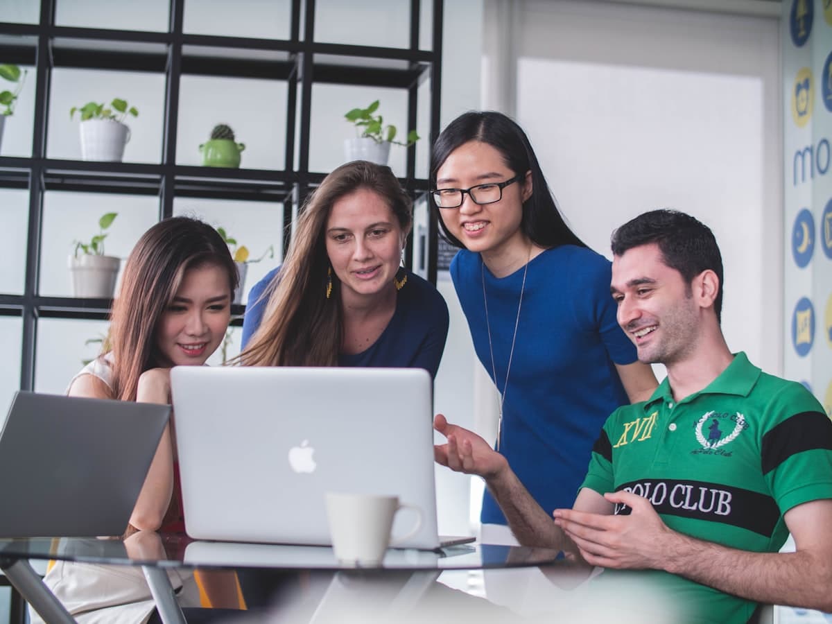 Cross-functional team collaborating in a modern workspace